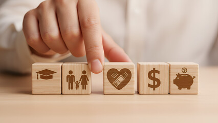 Wooden blocks with money, family, and education icons – financial literacy and values learning toy

