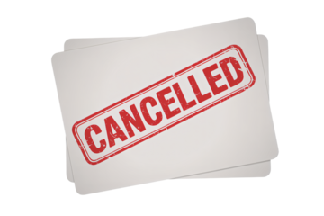 Cancelled documents with red stamp in close-up view on white background for office use