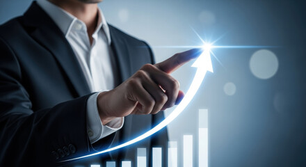 A man in a suit is pointing to a upward moving arrow with a bar chart in the backdrop, conveying success and growth on gradient blue.