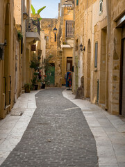 Fototapeta premium Victoria, Gozo, Malta — colorful traditional balconies and limestone facades in the old town