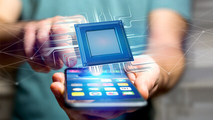 Businessman using a smartphone with a Processor chip and network connection
