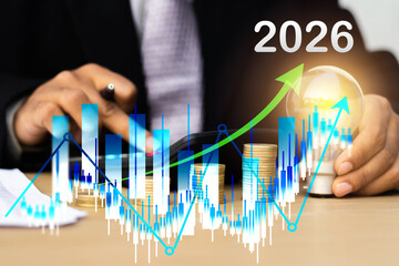Businessman draws increase arrow graph corporate future growth year 2026. Business plan for increase in 2026 year. Development to success and motivation in new year 2026