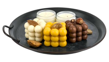 Bubble cube candles, jars, and decorative items on a dark metal tray