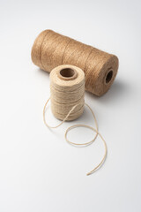 Natural Jute Twine Spools on White Background