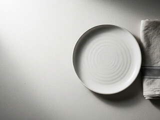 Minimalist white plate and napkin