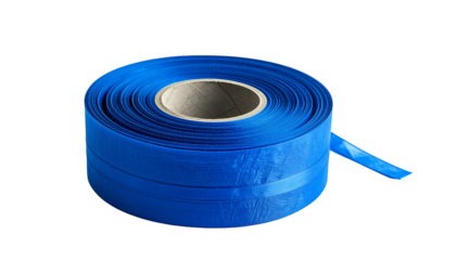 Rolled-up blue flexible tubing with a cardboard core, isolated on a black background