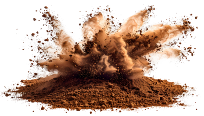 A brown powder explosion captured mid-air against a black background