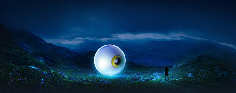 Digital artwork with glowing eye in mountain landscape watching person in front. Concept of strategic vision, long term goals, leadership foresight, navigating uncertainty, and business ambition.