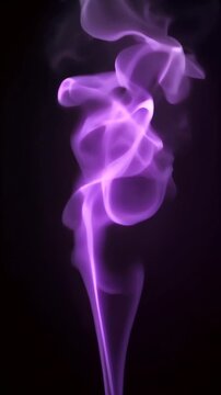 Smoke is rising from a cigarette on a black background