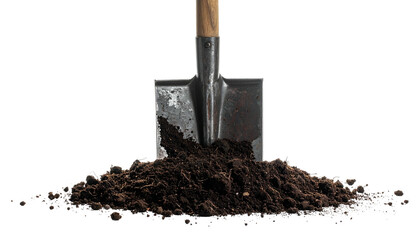 A metal shovel stands upright, partially buried in a mound of dark, rich soil, black background