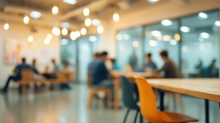 Bright collaborative workspace with blurred focus, warm lighting and modern furniture conveying productive teamwork and relaxed atmosphere