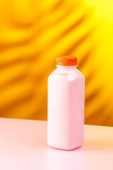 Strawberry milkshake smoothie in eco disposable jar.