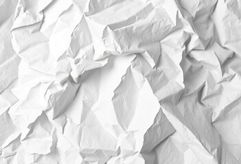 Obraz premium Close-up of a crumpled sheet of white paper, showing deep creases and texture, office, wrinkled paper