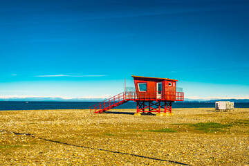 Red Lifeguard Tower on Empty Pebble Beach in Batumi, Georgia