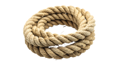 Close-up of coiled, thick rope, tan in color, set against a black background