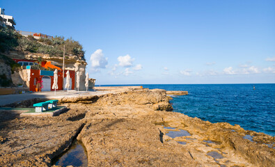 Marsalforn, Malta — coastal town with rocky shoreline and azure Mediterranean Sea