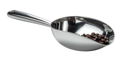 A shiny silver scoop holds dark coffee beans on a plain black background