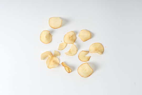 cassava chips or keripik singkong on white background, fried cassava snack.