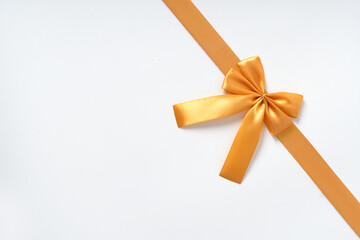 golden ribbon on white background, suitable for birthday, celebration and social media purposes.