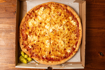 Pizza with ricotta in a box