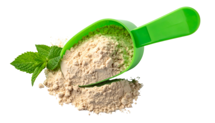 Beige powder in green scoop next to mint sprig, against black