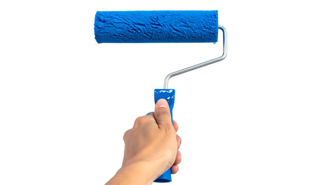 A hand holds a blue paint roller against a black background