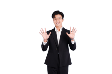 Confident Businessman: A poised and professional businessman stands tall, hands raised to showcase a gesture of openness and assurance. He exudes confidence in his sleek black suit.