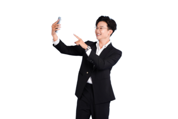 Selfie Moment: A dapper individual with glasses takes a selfie using a smartphone, posing with a confident smile, in a setting of everyday life.