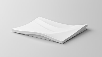 Abstract white ceramic dish with a unique, organic shape.