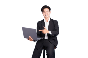 Focused Professional with Laptop: A sharp dressed professional sits confidently, pointing towards a laptop, embodying innovation and expertise.