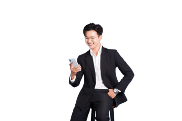 Mobile Interaction: A sharp-dressed individual, deeply engaged with his mobile phone, exudes a confident and approachable demeanor, suggesting a seamless blend of technology and modern lifestyle.