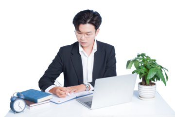 Focused Office Work: A diligent professional engrossed in focused work, working at the desk.