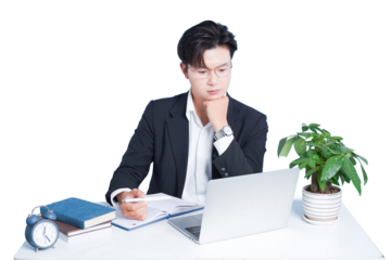 Focused Businessman at Desk: A contemplative businessman, meticulously examining notes, a laptop, and an attentive desk plant. The scene emanates a spirit of professional focus and modern office life.