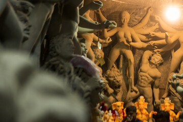 Goddess idols are being prepared with clay before festival. Idols being made for Durga Puja festival.