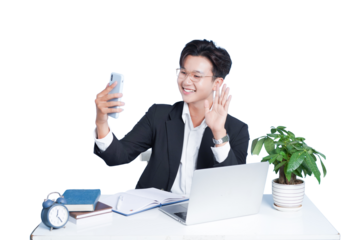 Virtual Connection: A modern professional, engaged in a video call, radiates positivity and warmth, his gesture a welcoming wave, embodying effective communication and collaboration.