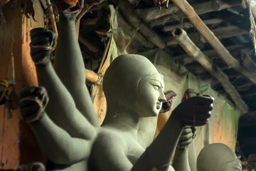 Goddess idols are being prepared with clay before festival. Idols being made for Durga Puja festival.