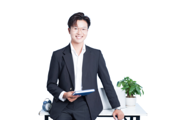 Confident Professional in Office: A sharp, poised professional stands by a desk, notebook in hand, emanating a sense of competence and approachability. The image is set in office environment