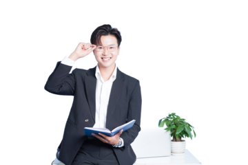 Confident Professional in the Workplace: A young, smartly dressed professional exudes confidence and approachability while holding a notebook, creating a powerful image of competence and capability.