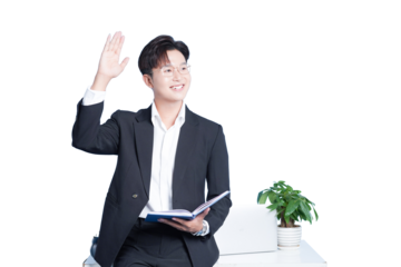 Confident Business Professional: A stylish businessman, dressed in a sharp suit, enthusiastically raises his hand, holding a notebook and smiling with confidence. Symbolizing an interactive workplace.