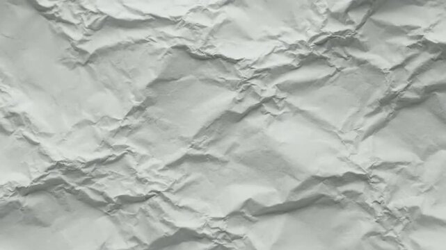 Crumpled white paper texture background with creases and folds. empty copy space product mockup backgrounds