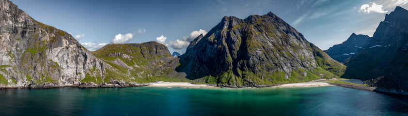 Obraz premium Kvalvika Sand Beach With Mountains And Ocean On Lofoten Islands In Norway