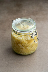 Homemade Fermented Sauerkraut in a Glass Clip-Top Mason Jar