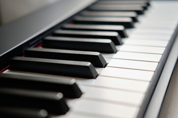 Close up of piano keys, partially shown