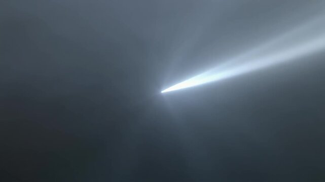 Focused beam of light cutting through soft haze, creating a cinematic minimal scene that symbolizes sudden clarity, decisive change, strategic insight, and modern innovation.