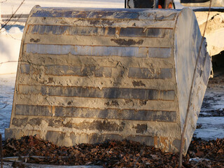 dirty, muddy shovel from an excavator