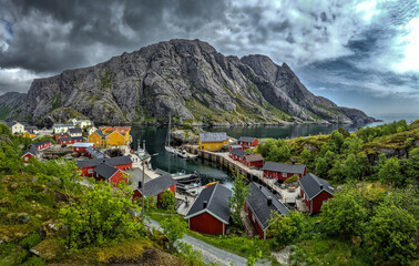 Old Fishermen Village Nusfjord With Rorbuer Huts And Calm Fjord On Lofoten Islands In Norway