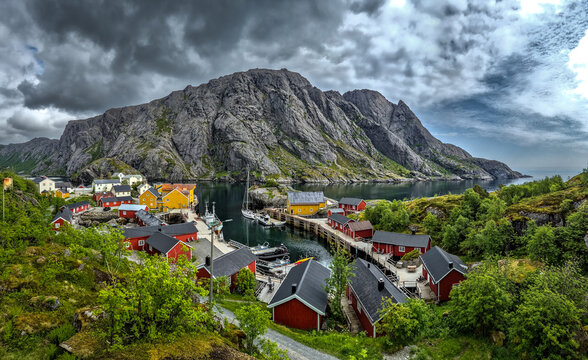 Old Fishermen Village Nusfjord With Rorbuer Huts And Calm Fjord On Lofoten Islands In Norway