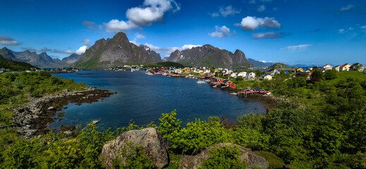 Village Reine With Mountains And Gravdalsbukta Near Reinebringen On Lofoten Islands In Norway