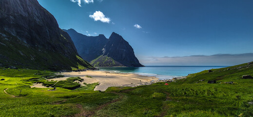 Kvalvika Sand Beach With Mountains And Ocean On Lofoten Islands In Norway
