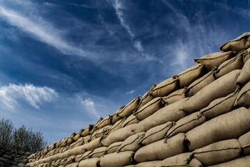 Tacked sandbags in a World War I trench at Yorkshire Trench Ypres. Close up of reinforced trench walls and dugout entrance in Flanders Fields. WWI Western Front military defense and shelter.
